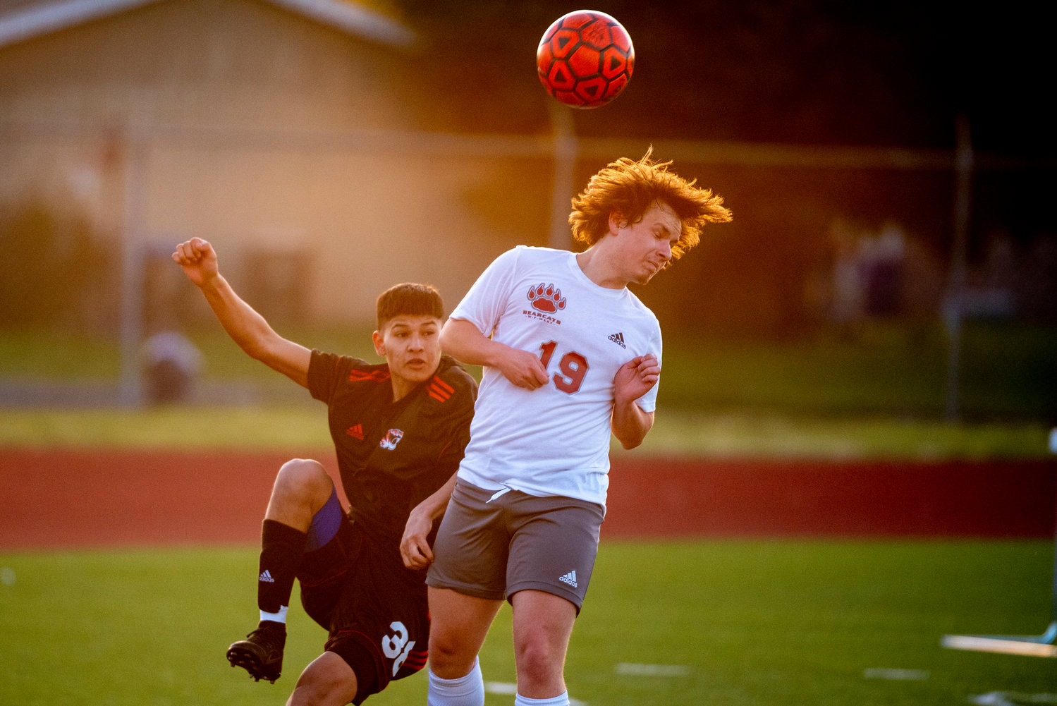 W.F. West's James Villanueva (19) goes for a header against Centralia's David Arevall-Correa (38) during a game in Centralia on April 22.