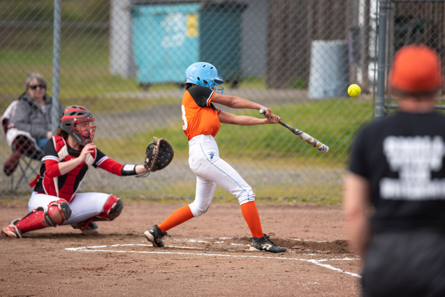 Rainier's Madison Mounts connects on a Toledo pitch during a road game on April 25.