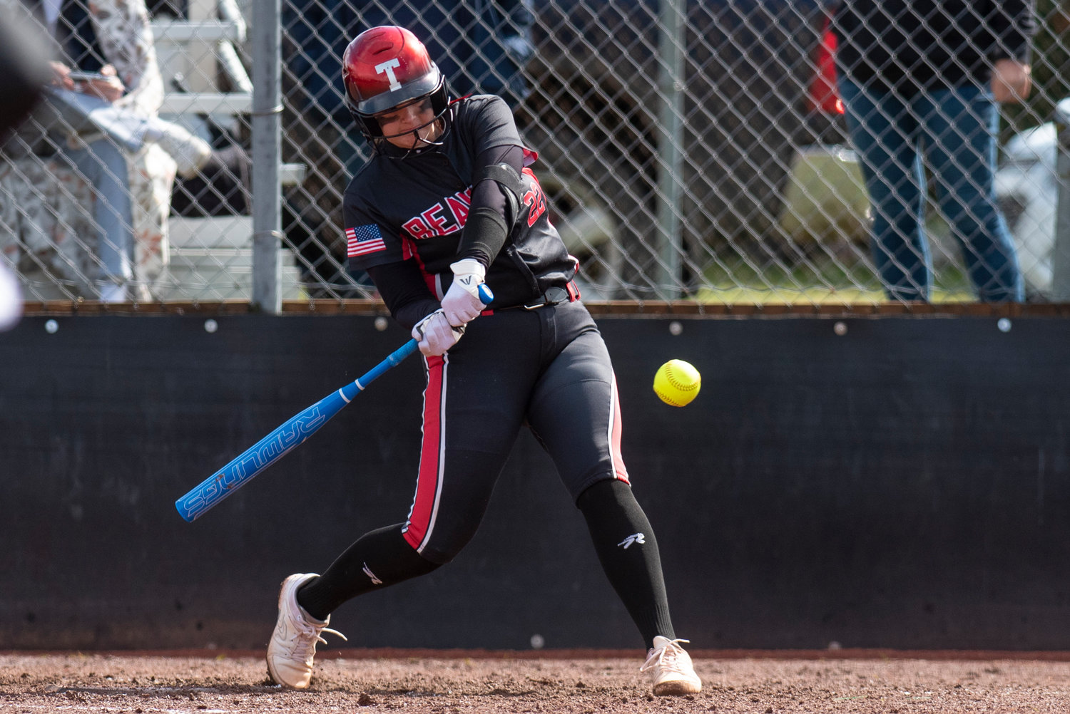 Tenino's Courtney Backman lines up an Elma pitch during a home game on April 26.