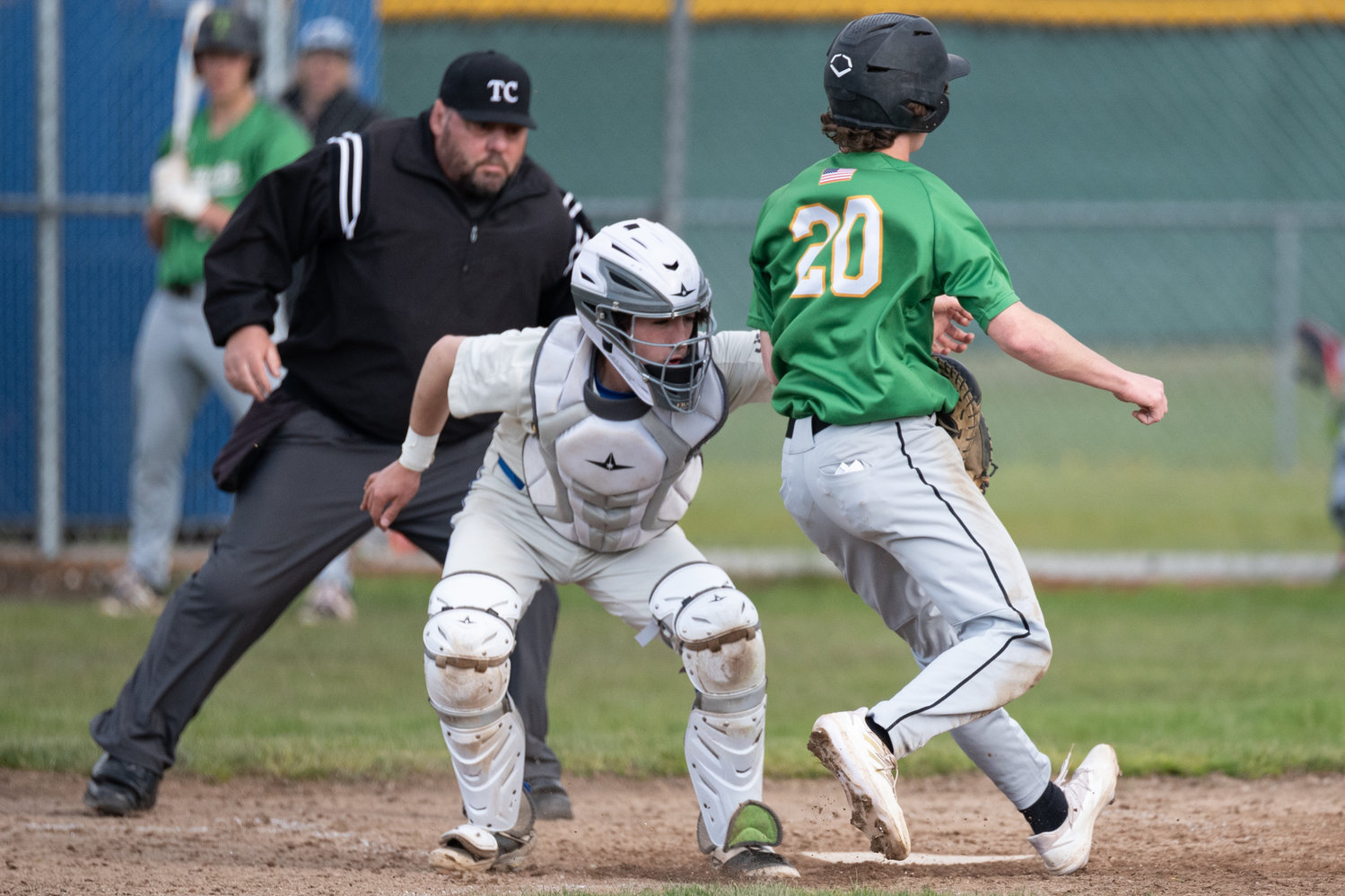 Rochester catcher Hayden Pietrus tags out Tumwater's Derek Thompson at home plate April 27.