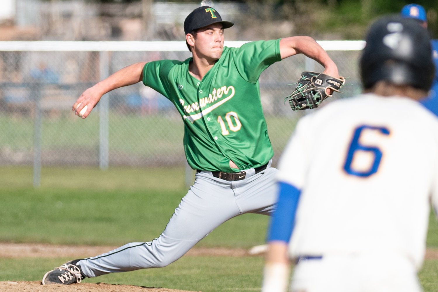 Tumwater ace Ryan Orr winds up to deliver a pitch against Rochester April 27.