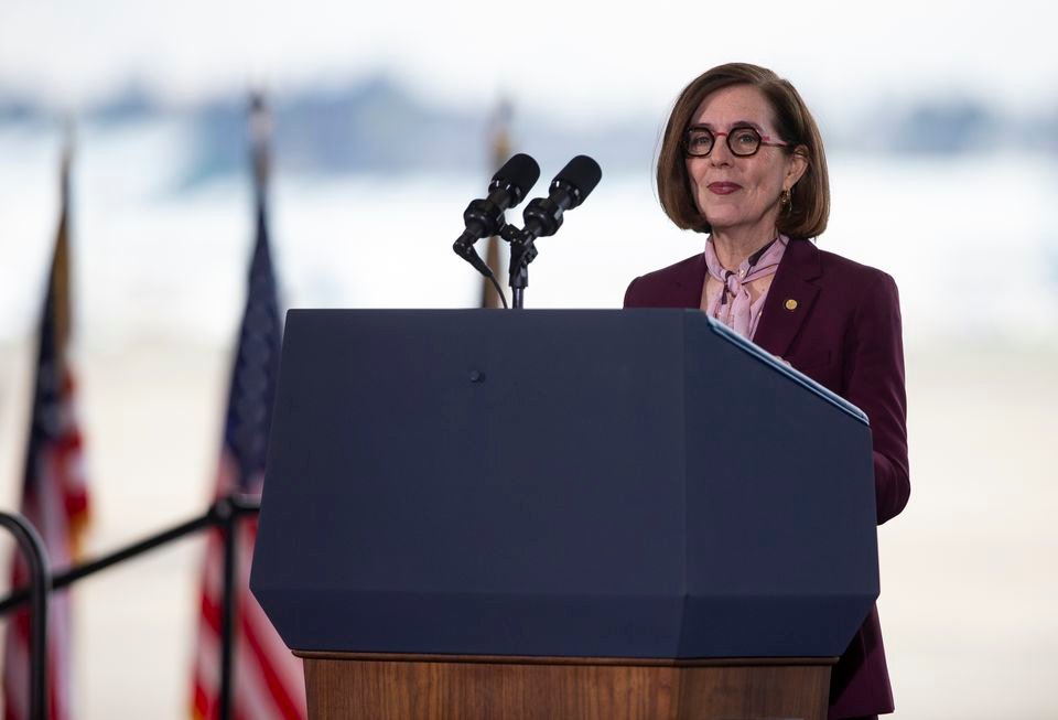 Oregon governor Kate Brown spoke ahead of President Joe Biden at the Portland airport on Thursday afternoon, April 21, 2022.
