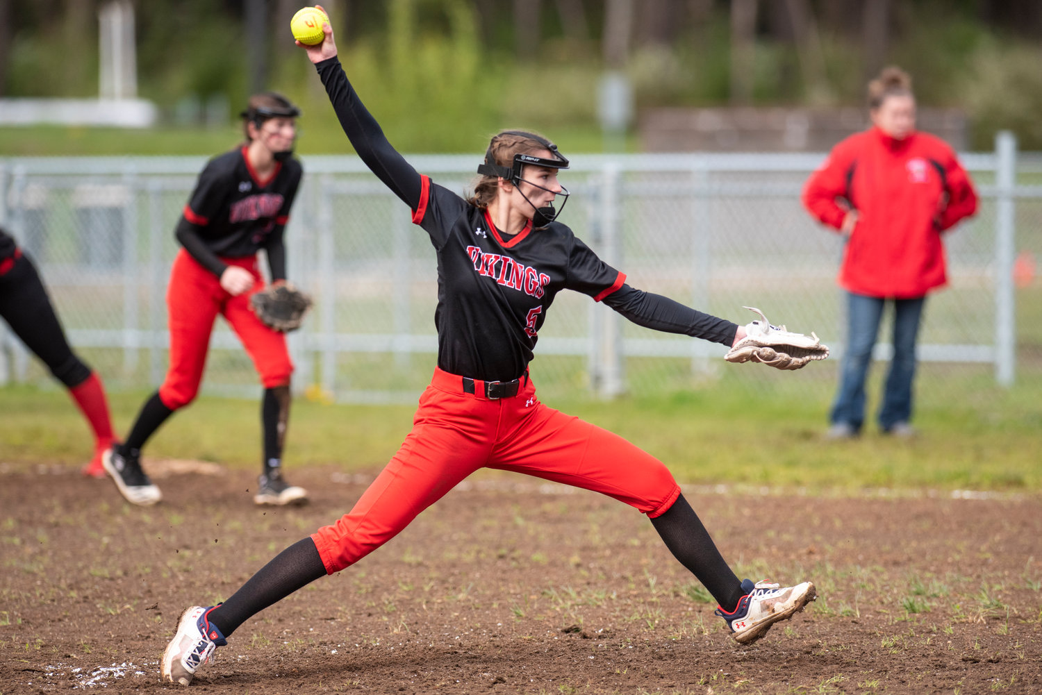 Mossyrock's Erin Cournyer winds up to deliver a pitch to an Oakville batter during a road game in Chehalis Village on April 28.