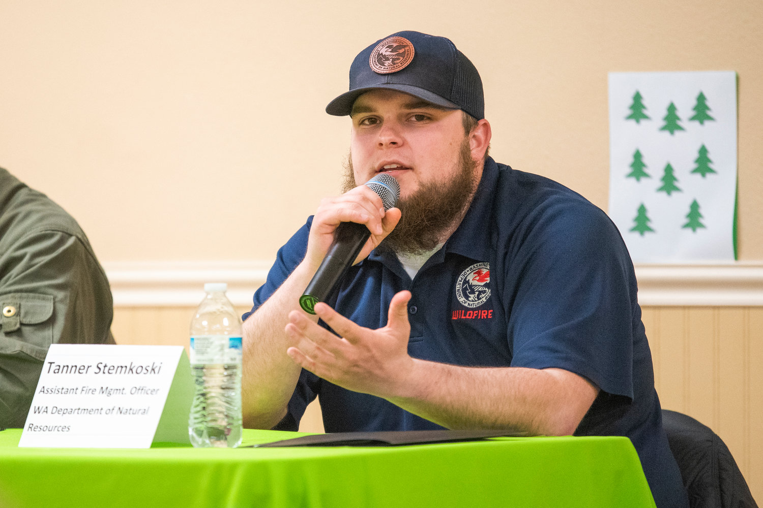Assistant Fire Management Officer Tanner Stemkoski, with the Washington State Department of Natural Resources talks about the Community Fire Wise program Thursday night at the Packwood Community Center.