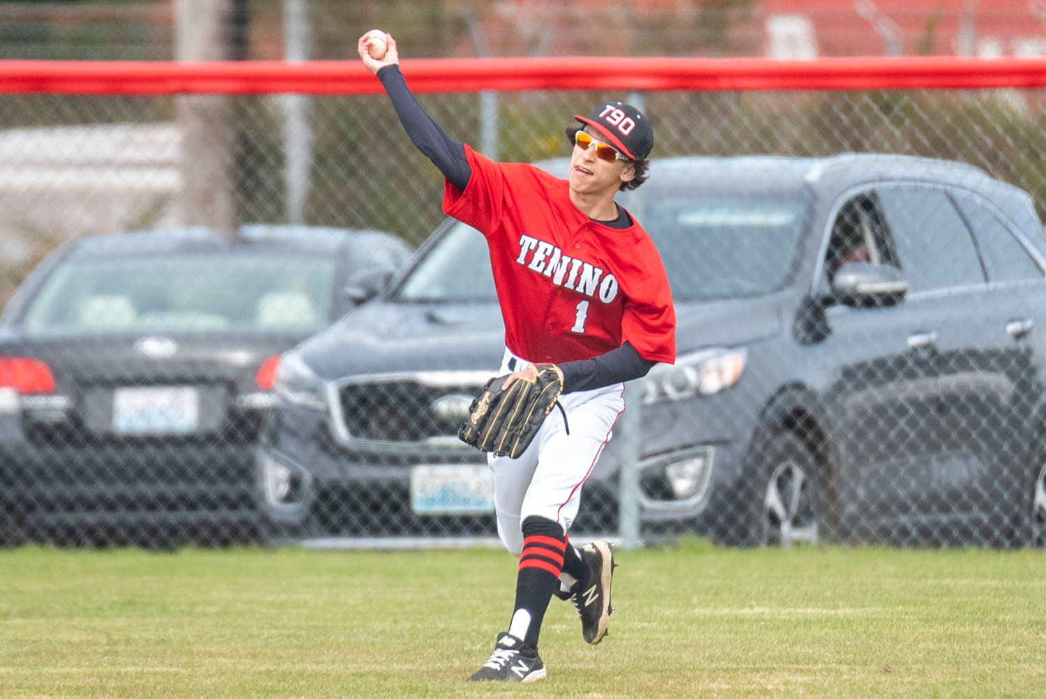 Tenino's Kaden Sayamnet makes a throw from the outfield during a home game against Elma on April 29.