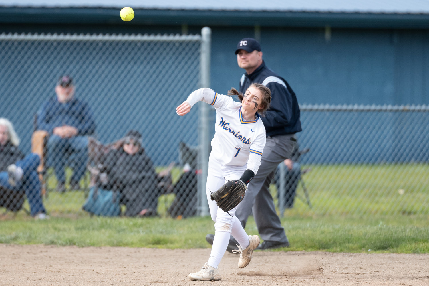 Rochester's Jessa Lenzi looks to throw to first for an out against W.F. West April 29.