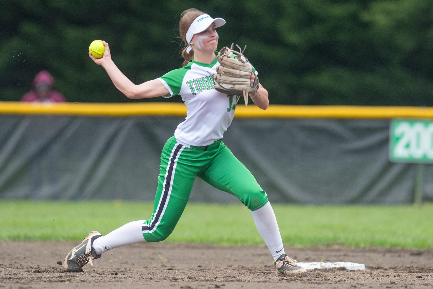 Tumwater shortstop Aly Waltermeyer makes a throw to first base during a home game against W.F. West on May 2.