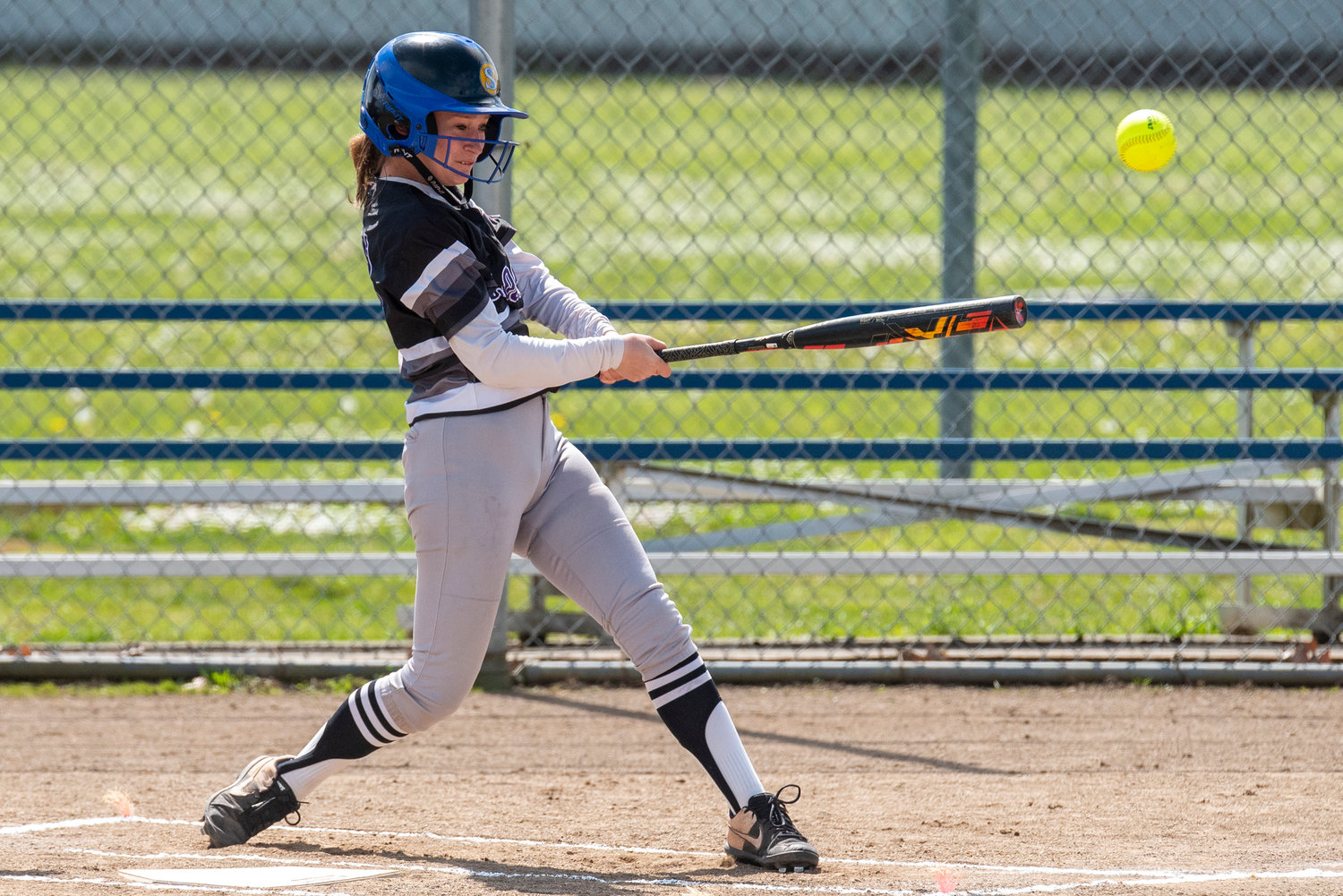 Onalaska's Desi Smith connects on an Adna pitch during a road game on May 4.