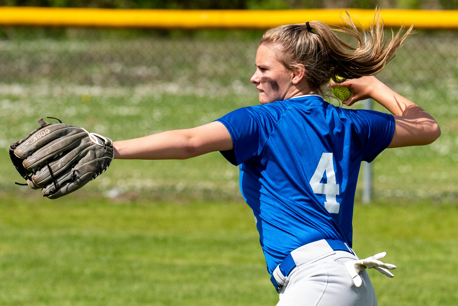 Adna's Gracie Beaulieu makes a throw from right field during a home game against Onalaska on May 4.