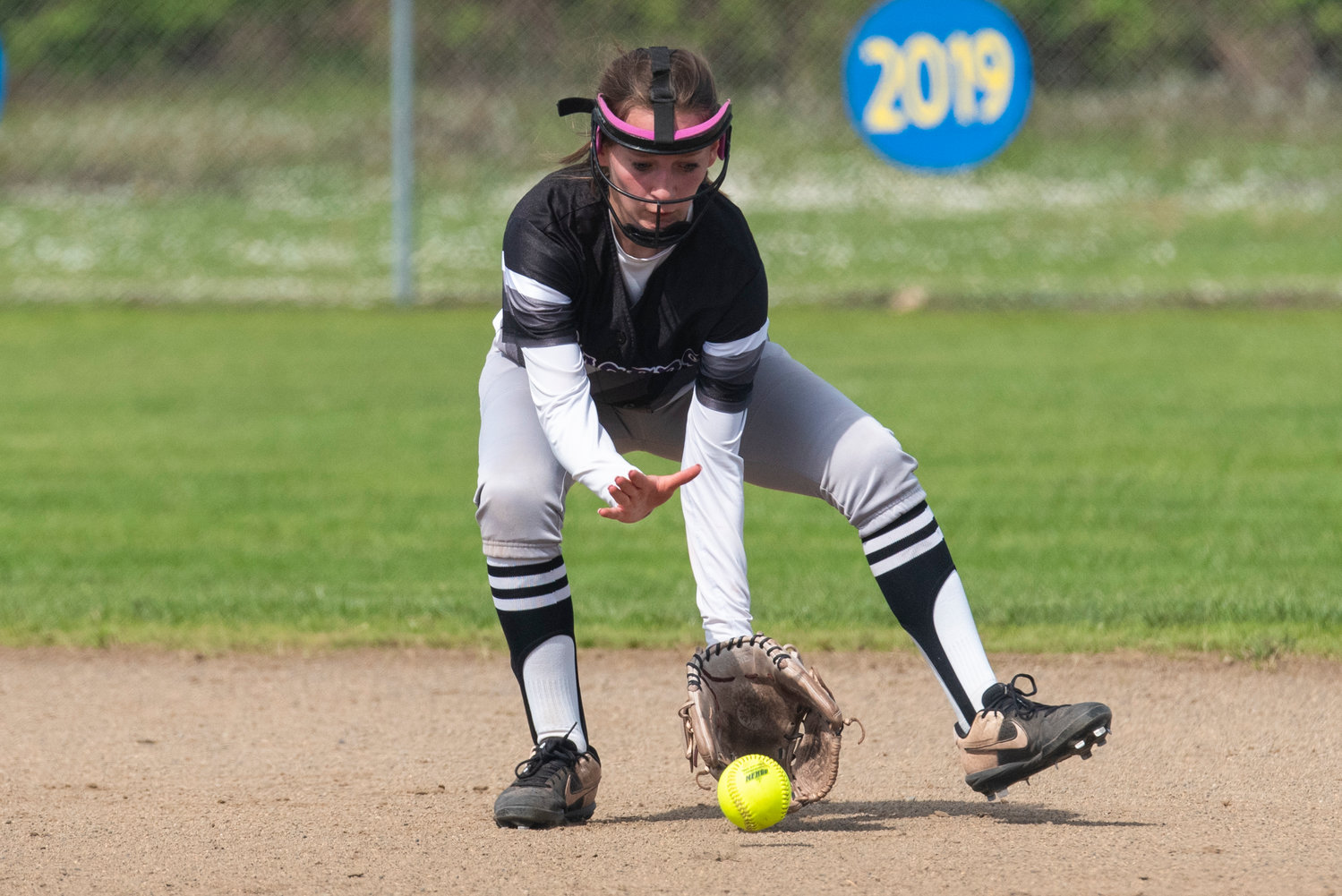 Onalaska second baseman Desi Smith fields an Adna grounder during a road game on May 4.