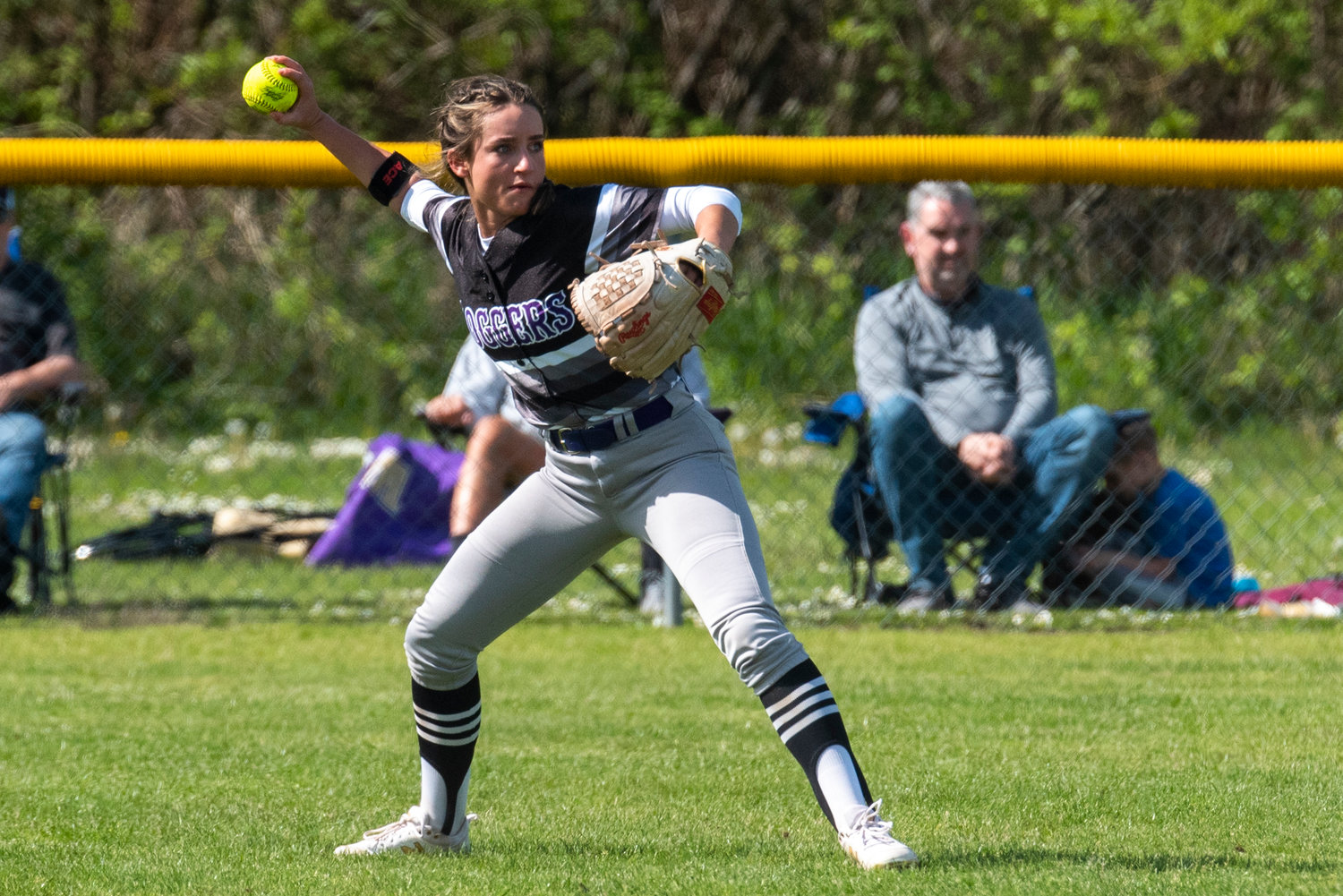 Onalaska's left fielder makes a throw during a road game in Adna on May 4.