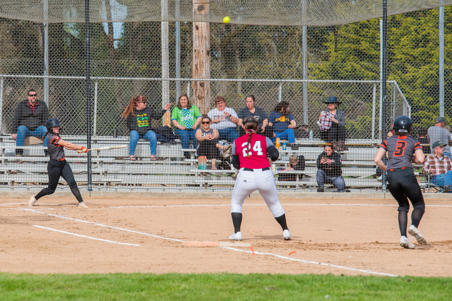 Centralia’s Jadyn Hawley (2) sends the ball up with a swing during a game against the Bearcats Wednesday afternoon.