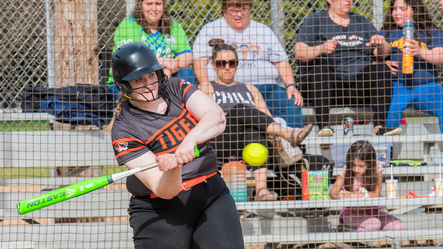 Centralia’s Liza Hubbard (18) watches the ball into her bat during a game against the Bearcats Wednesday afternoon.