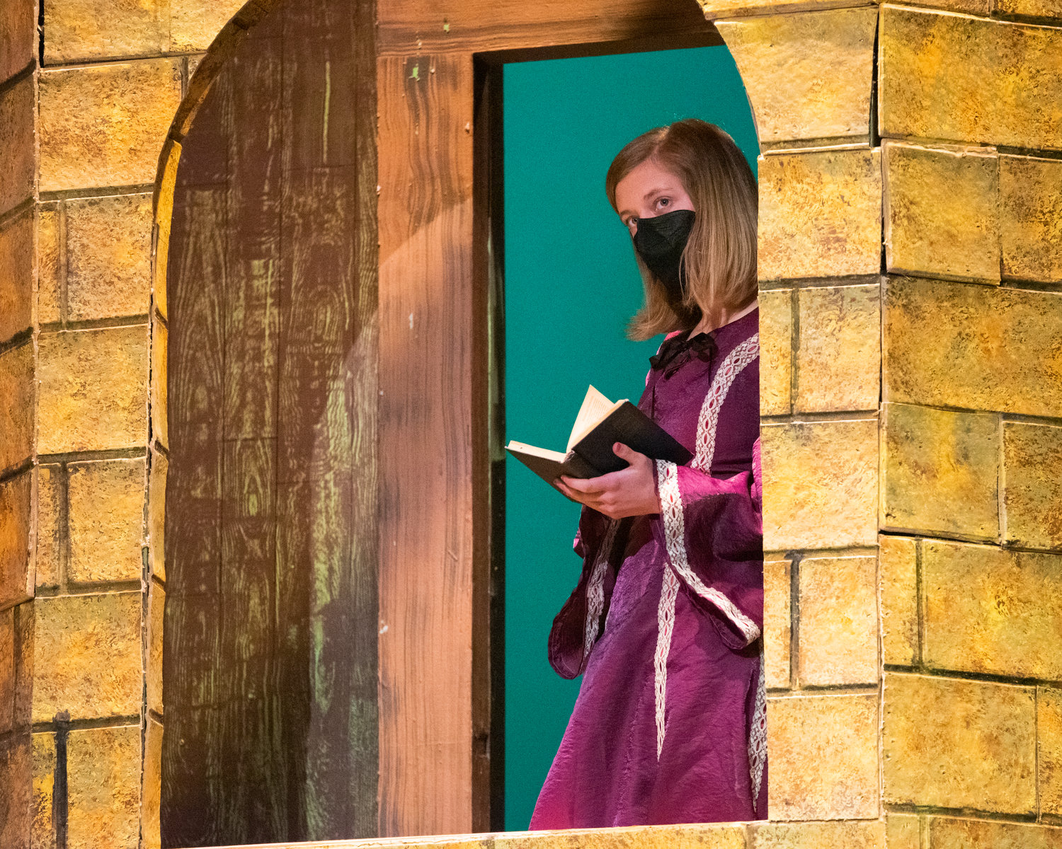 Madi Stark looks on while playing Rapunzel during dress rehearsals for “Into The Woods,” presented by the Centralia College Theatre program.
