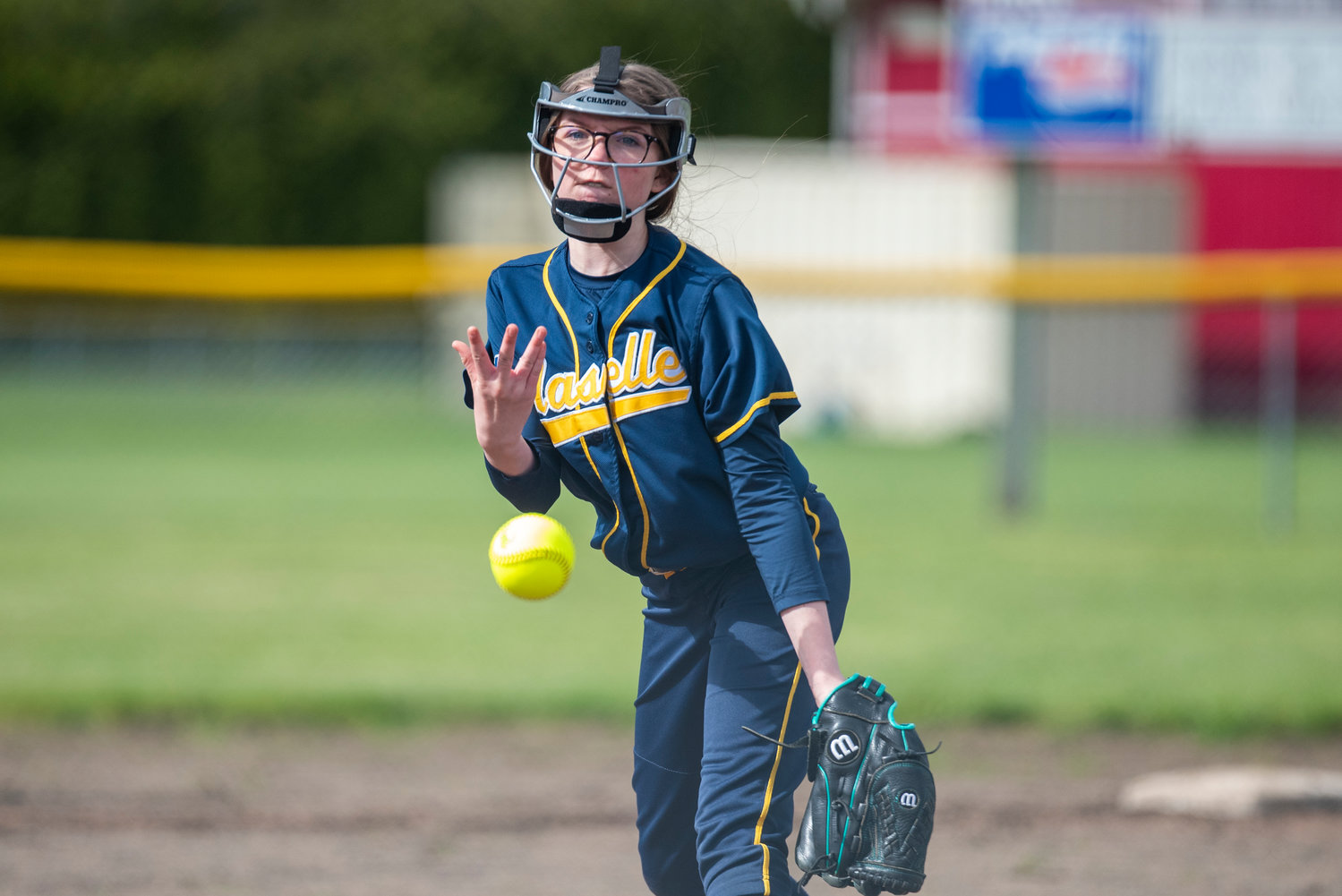 Naselle's Mallory Helbey tosses a pitch to a Mossyrock batter during an 11-10 loss on the road Monday, May 9.