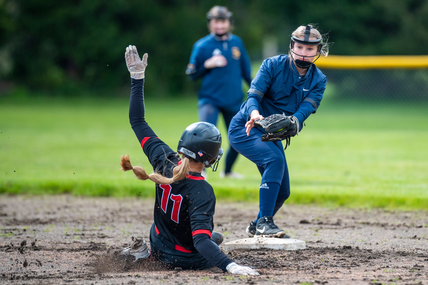 Mossyrock's Hailey Brooks (11) slides safely into second base for a steal against Naselle on May 9.