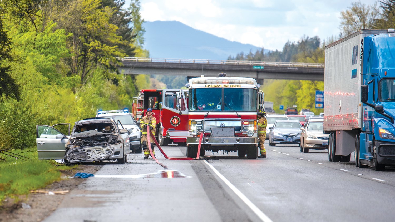Crews from Littlerock Fire and Rescue Station 4 and the Riverside Fire Authority respond to a car fire in the southbound lane of Interstate 5 near milepost 86 Tuesday afternoon near Grand Mound. There were no reports of injuries.