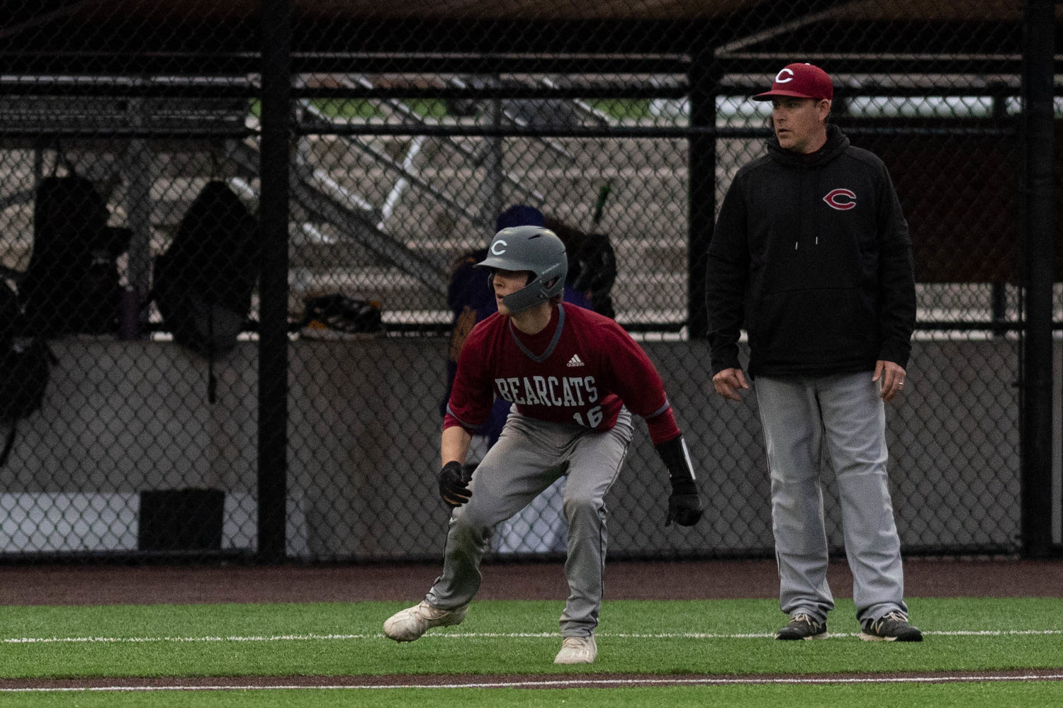 W.F. West's Deacon Meller navigates the bases as coach Bryan Bullock looks on against Columbia River in the 2A District 4 semifinals May 11 at Ridgefield.