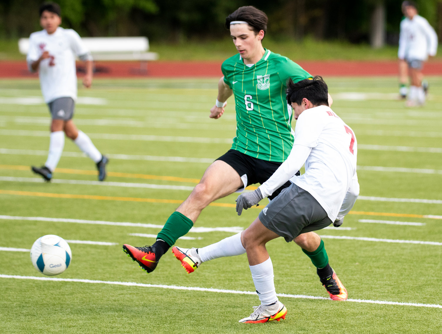 W.F. West's Damian Hernandez (7) shoots a pass past Tumwater's William Lower (6) during the district semifinals on May 12.