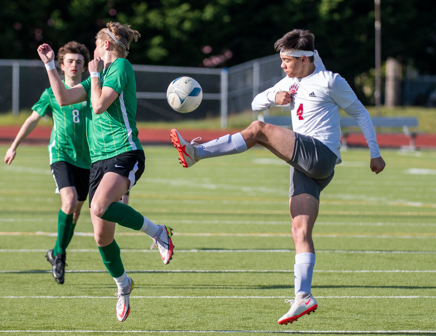 W.F. West's Cameron Kunz (4) boots the ball during the district semifinals against Tumwater on May 12.