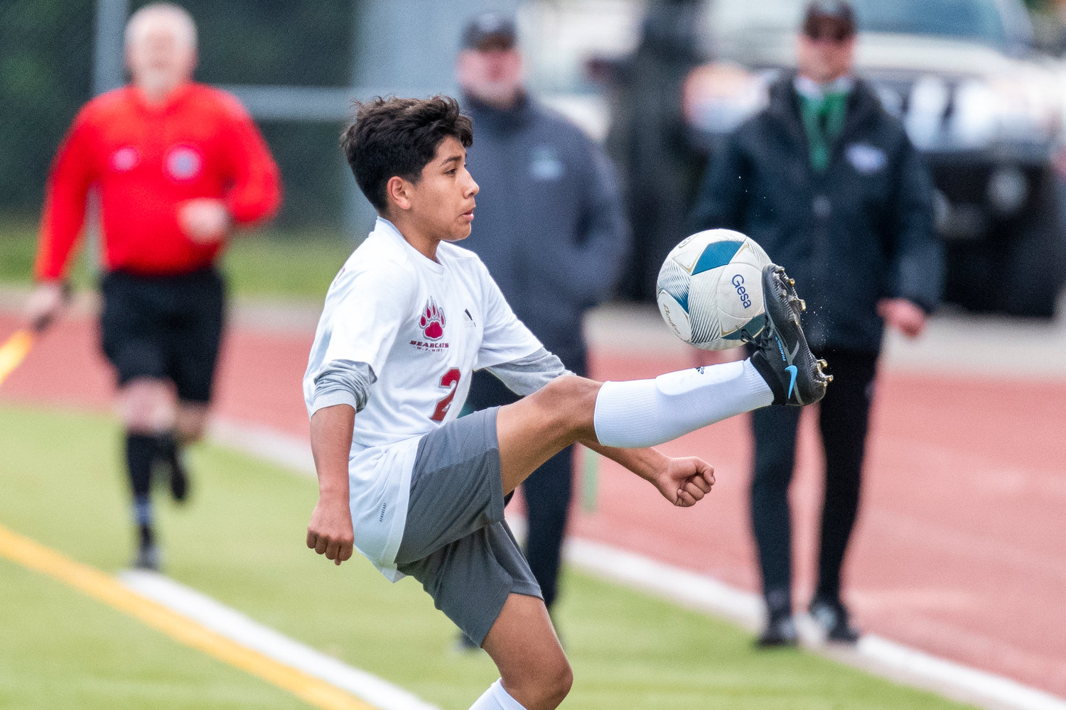W.F. West's Adrian Jaimes gains possession against Tumwater during the district semifinals on May 12.