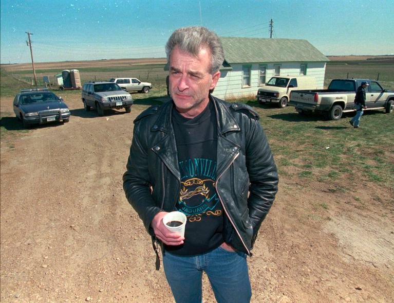 FILE - Randy Weaver, the object of the Ruby Ridge siege, visits with the media at the main FBI roadblock outside the Freemen compound in Montana on April 27, 1996.