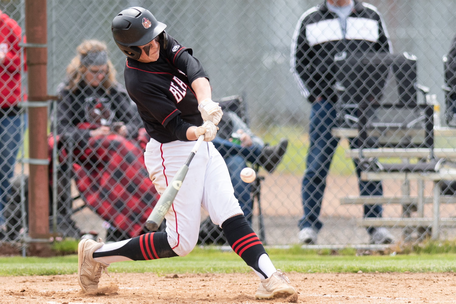 Tenino's Kellan Knox makes contact with a pitch against King's Way Christian May 13 in the 1A Evergreen District playoffs in Castle Rock.