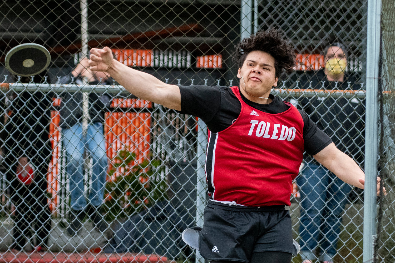 Toledo's Joshhill Tilton uncorks a discus throw during the Central 2B League Championships in Rainier on Friday, May 13.