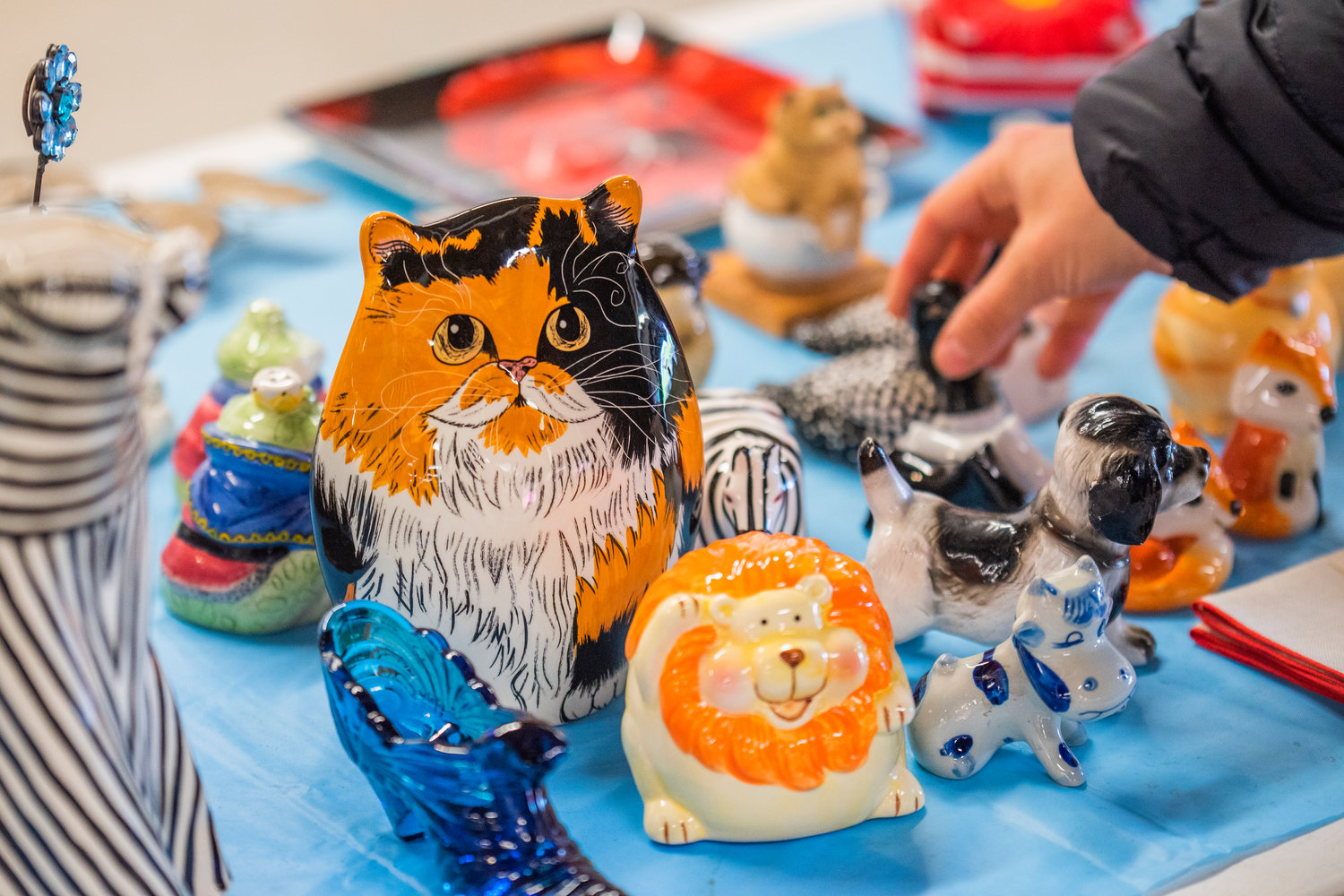 Animal-shaped decor is displayed on a table at the Southwest Washington Fairgrounds in Centralia on Saturday during the Spring Community Garage Sale.