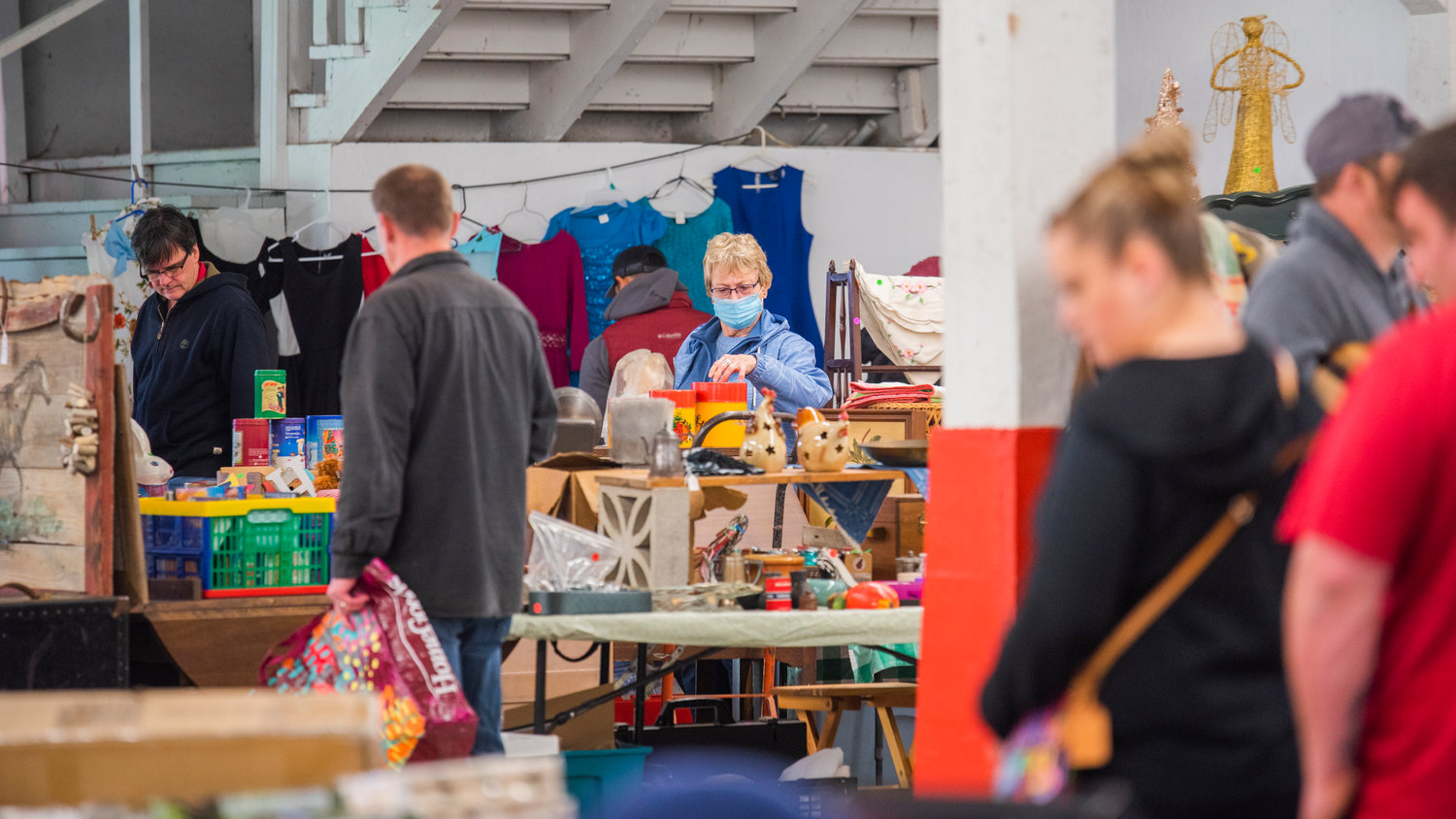 Shoppers hunt for deals at the Southwest Washington Fairgrounds in Centralia on Saturday during the Spring Community Garage Sale.