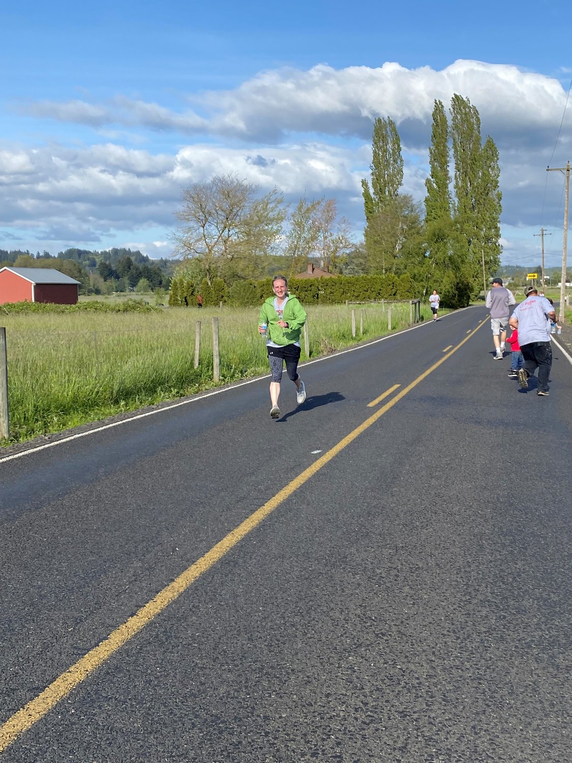 Kara McKinney runs in the Run for Five, Recovery is Alive 5k in Chehalis on Monday.