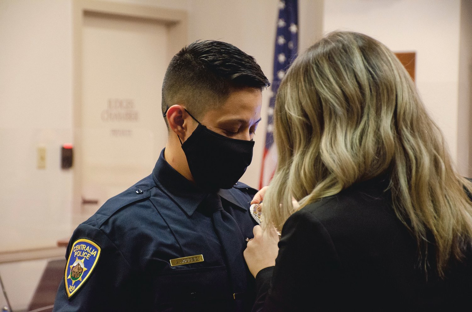 Winlock native Julie Jacobo was sworn in as an officer with the Centralia Police Department during a January Centralia City Council meeting. She read the Law Enforcement Code of Ethics and her oath of office was administered by police Chief Stacy Denham. Shortly after, Jacobo’s badge was ceremonially pinned to her uniform by wife Kalyn Jacobo. Jacobo comes to the job with five years of law enforcement experience, mostly with Lewis County Sheriff’s Office and Lewis County corrections. She also has experience as a SWAT team member, Swiftwater Rescue Team member, Lewis County JNET detective and a general investigations detective. “In this case, it became very clear to me that Officer Jacobo has an impeccable reputation, she’s a hard worker, is accountable, ethical and a very determined individual,” Denham said, adding that it was an “extremely easy” decision to hire her. According to Denham, Jacobo enjoys spending time with her wife and two sons, hiking, working out, playing in the snow and swimming.