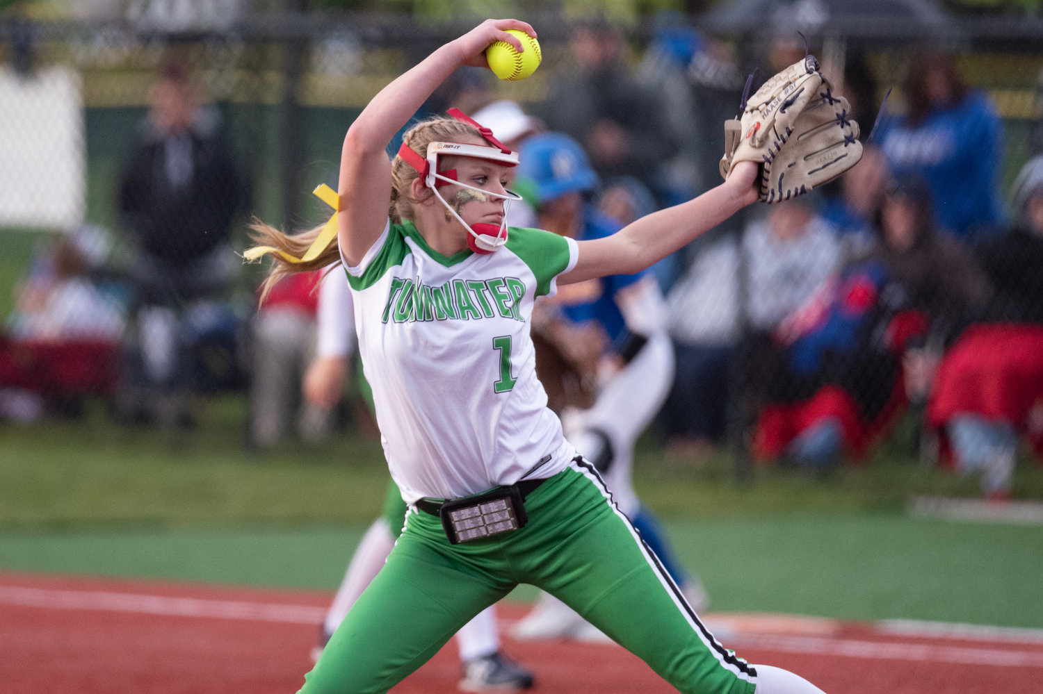 Tumwater pitcher Ella Ferguson winds up to deliver a strike against Rochester in the 2A District 4 tournament at Recreation Park May 19.