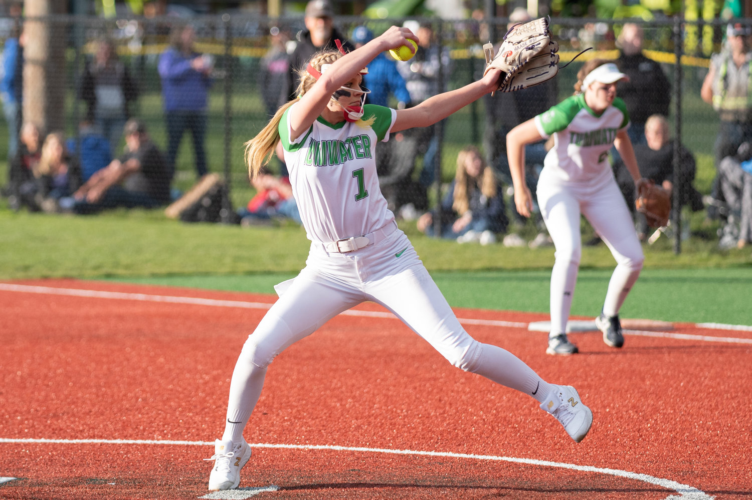 Tumwater's Ella Ferguson winds up to deliver a pitch against W.F. West in the 2A District 4 championship game at Rec Park May 20.