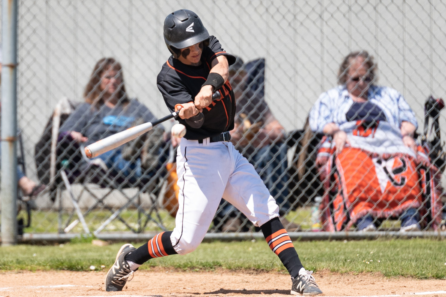 Napavine catcher Ashton Demerest makes contact with a pitch against Colfax in the 2B State Regional Round at Adna High School May 21.