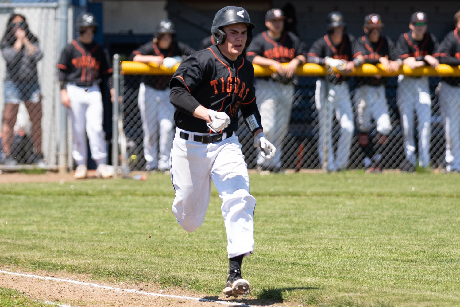 Napavine pitcher Gavin Parker looks to beat an out at first against Colfax in the 2B State Regional Round at Adna High School May 21.