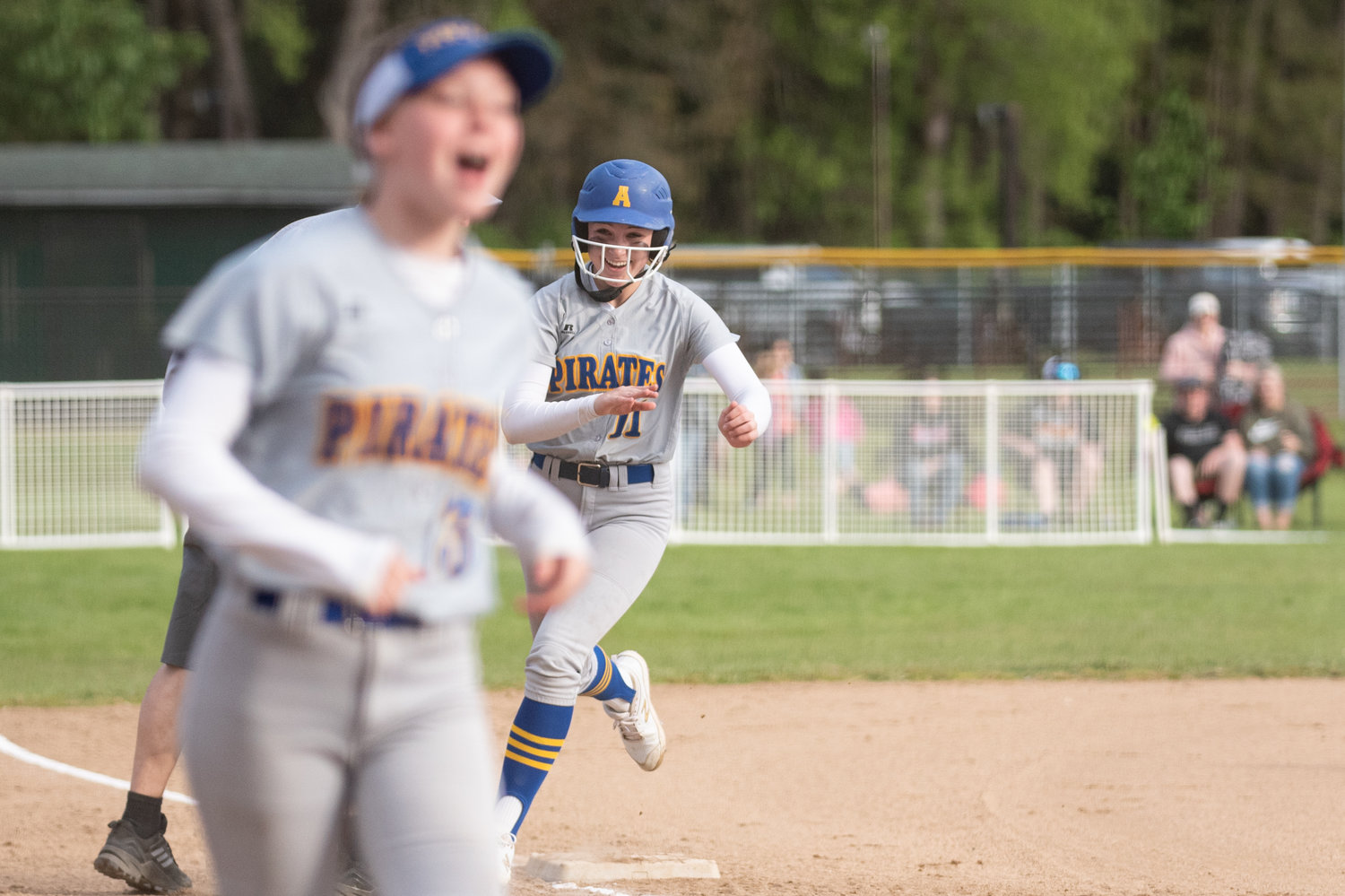 Adna's Danika Hallom runs toward home plate after hitting a home run against PWV in the 2B District 4 softball championship game at Fort Borst Park in Centralia May 21.