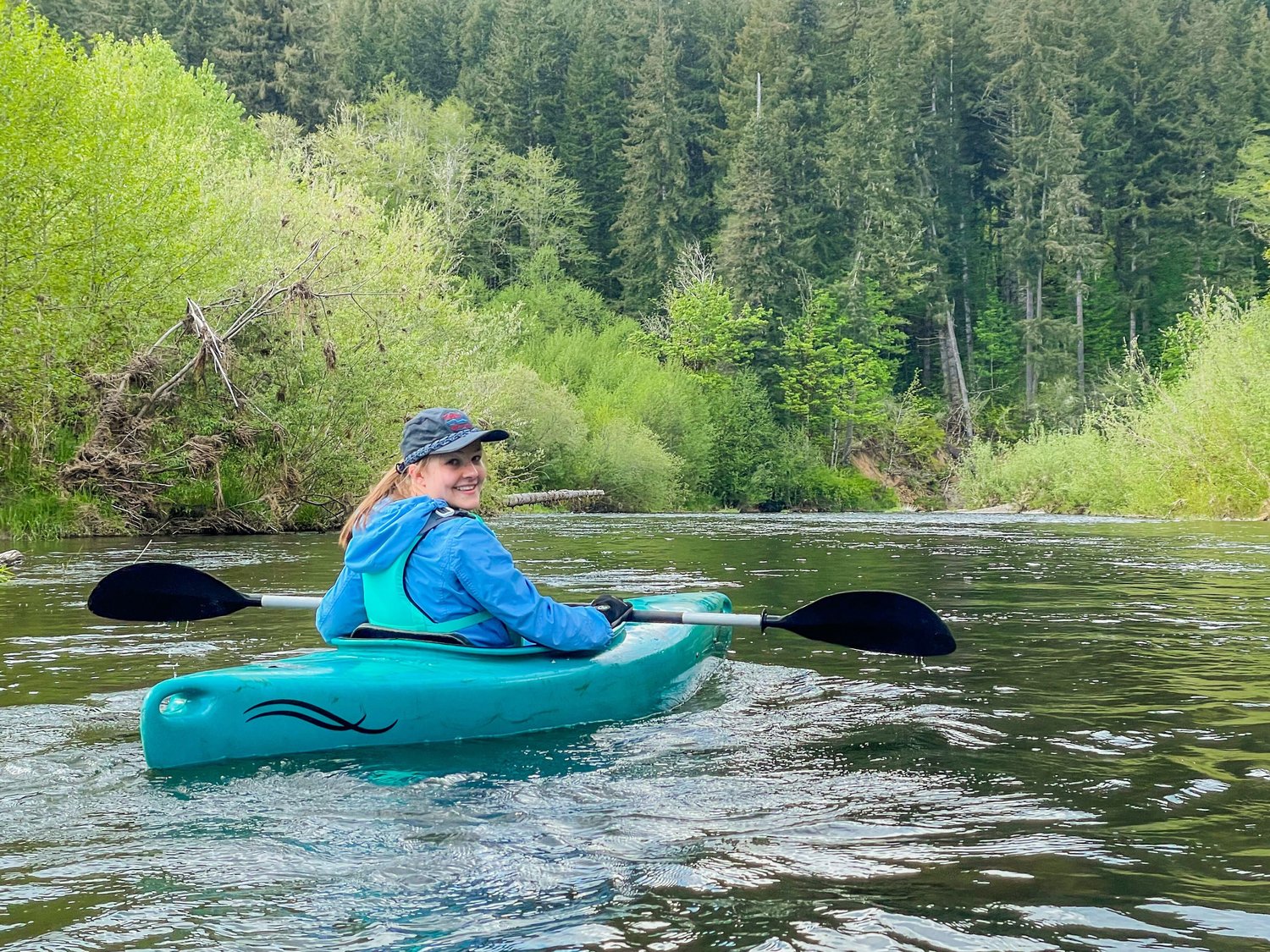 Reporter Isabel Vander Stoep paddles the Chehalis River near Doty on Saturday.