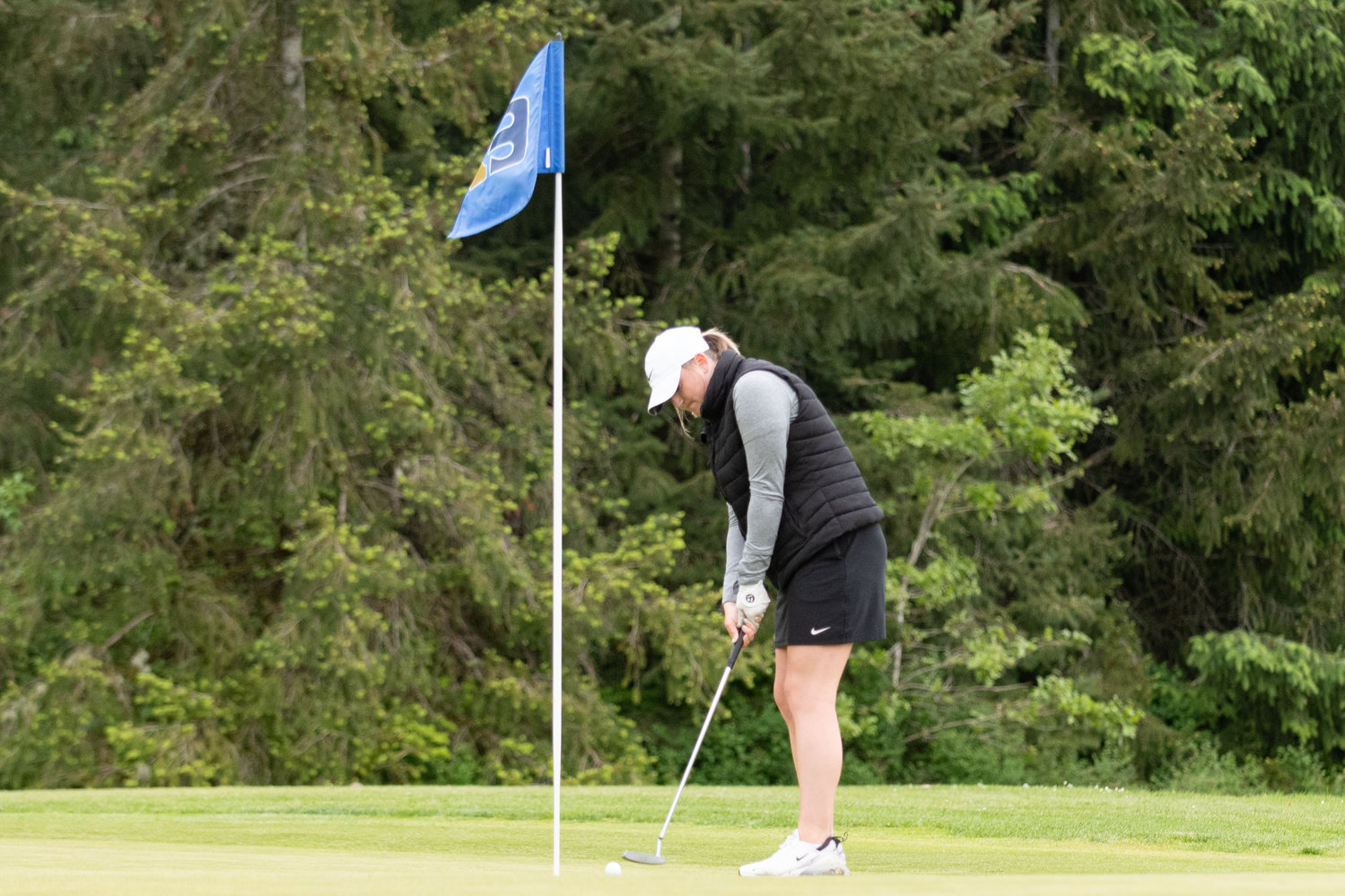 W.F. West golfer Natalie Eklund angles a short put at the 11th hole at Tumwater Valley Golf Course on the first day of the 2A State Girls Golf Championships May 24.