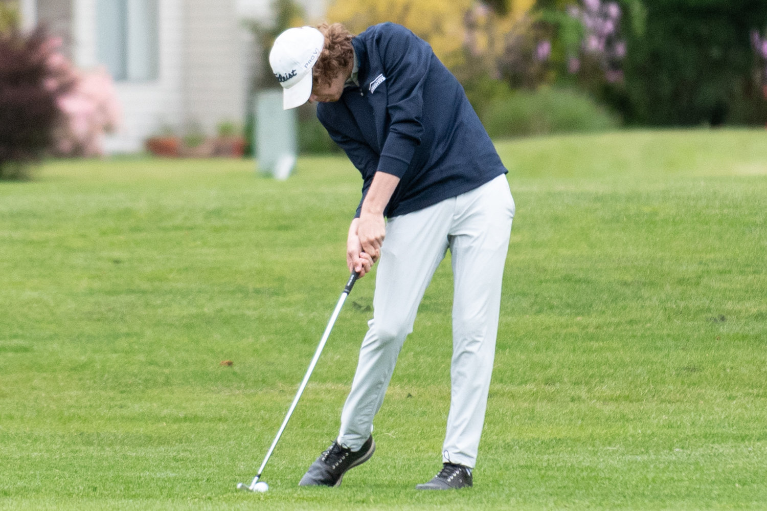 Centralia golfer Cole Wasson looks to drive a ball toward the first hole at Capital City Golf Course in Olympia at the 2A State Boys Golf Championships May 24.