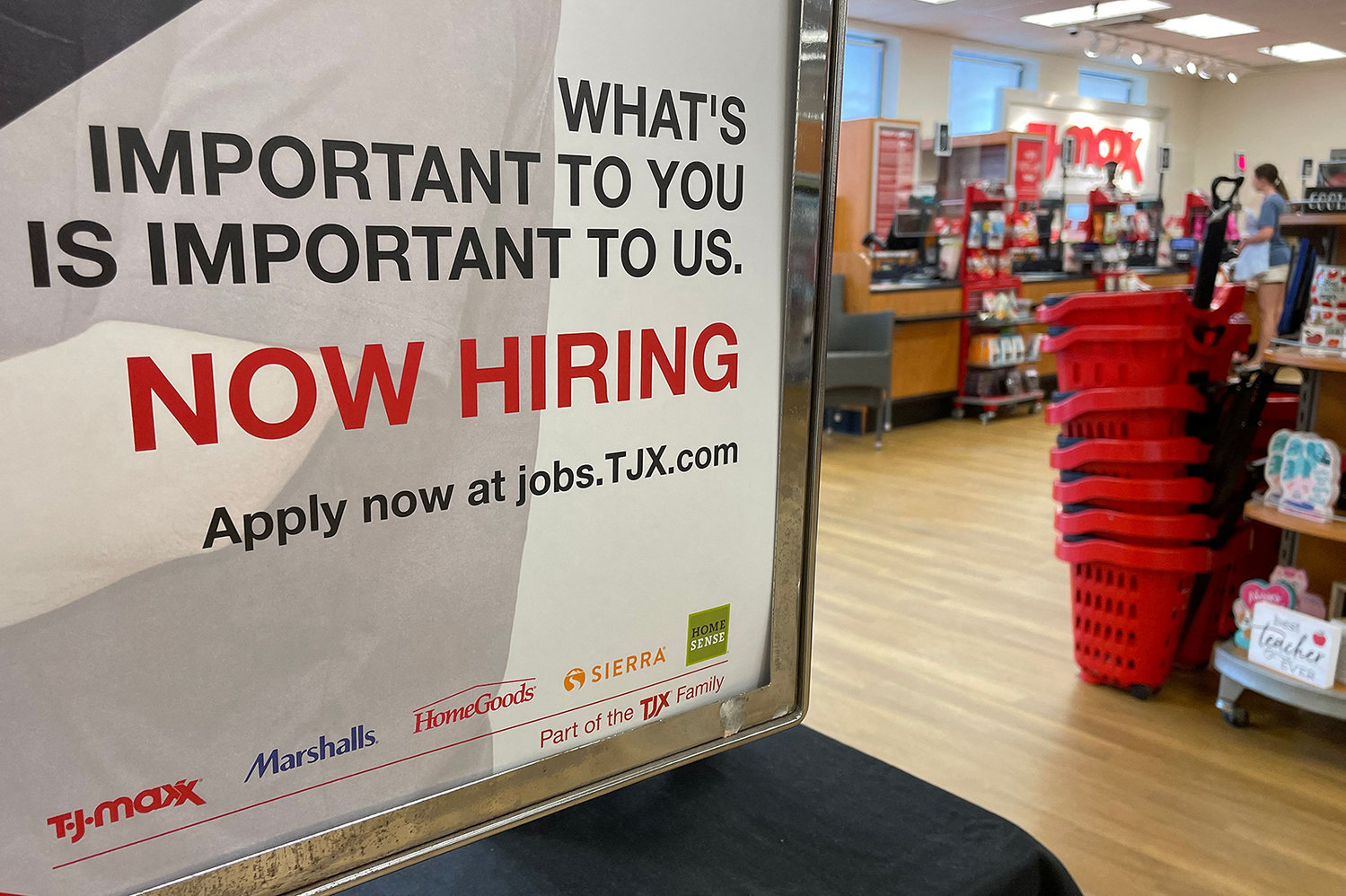 A "Now Hiring" sign at T.J. Maxx in Annapolis, Maryland, on May 16, 2022. (Jim Watson/AFP via Getty Images/TNS)