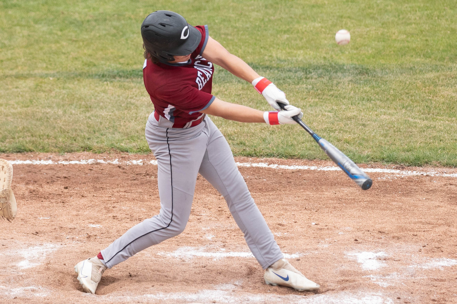 W.F. West's Riggs Westlund makes contact with a pitch against Tumwater in the 2A State Baseball Semifinals at Yakima County Stadium May 27.