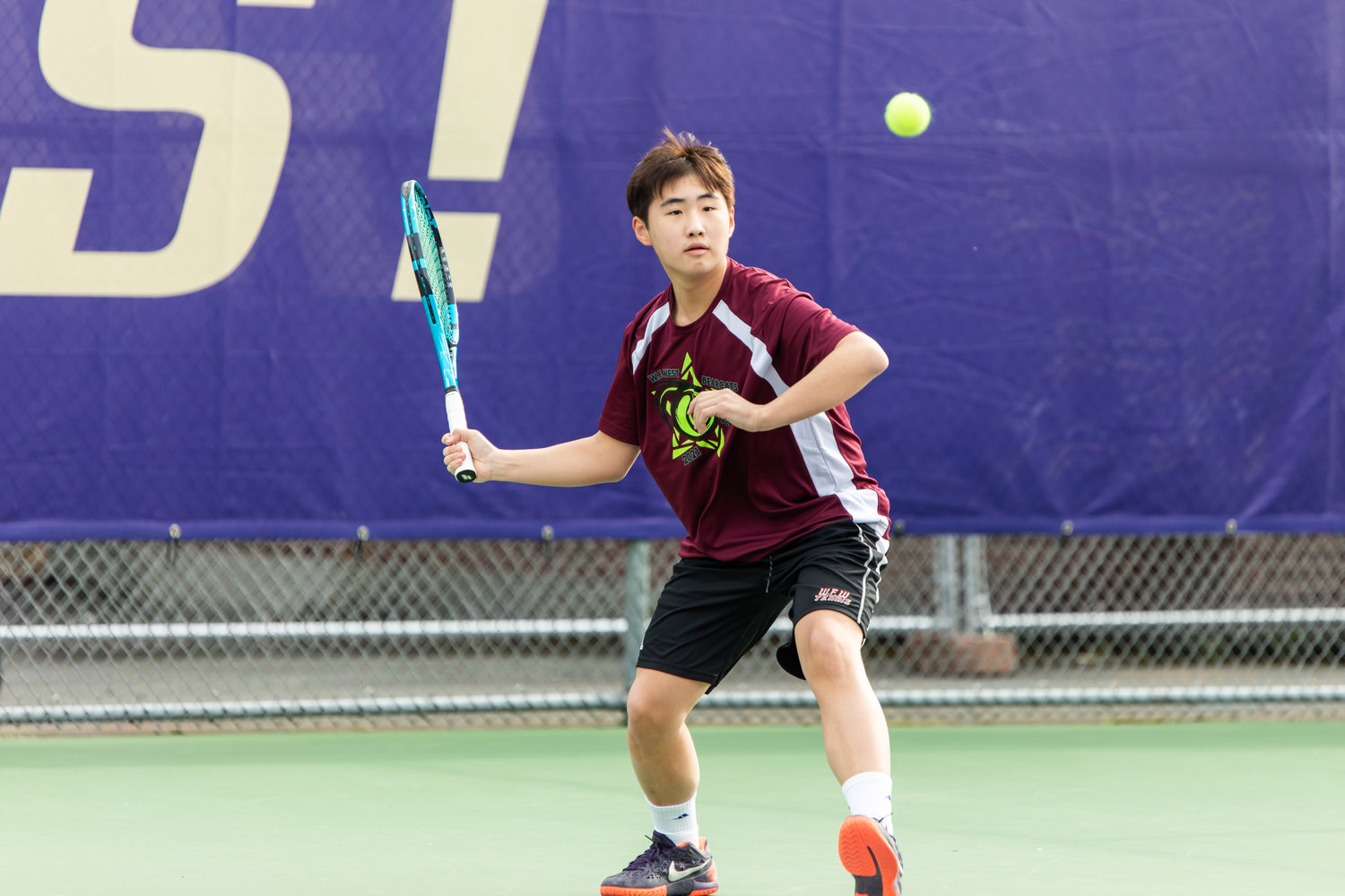 W.F. West's Javyn Han watches the ball during the first set of the 2A boys' singles tennis state competition.  first set of the 2A boys' singles tennis state competition on May 27, 2022.