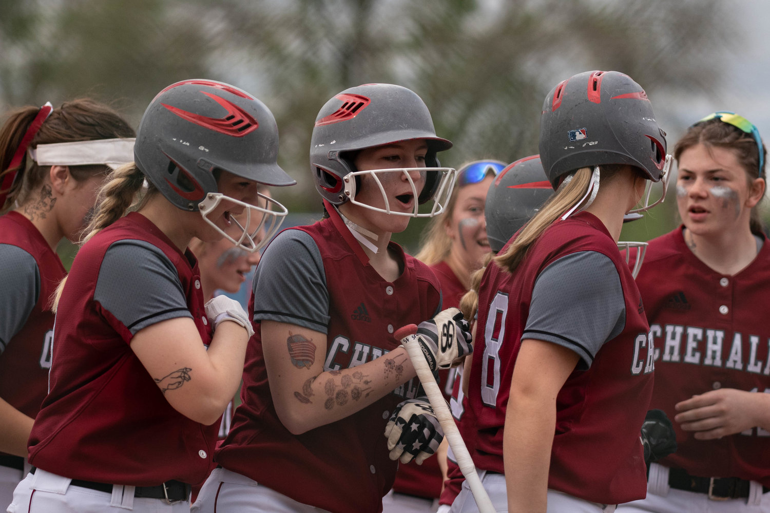 W.F. West celebrates after Saige Brindle's home run against Olympic in the 2A State Quarterfinals at Carlon Park in Selah May 27.