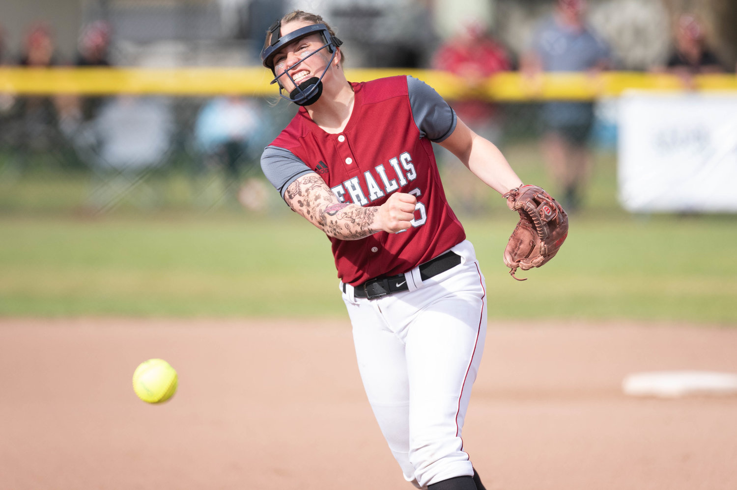 W.F. west pitcher Kamy Dacus delivers a pitch against Olympic in the 2A State Quarterfinals at Carlon Park in Selah May 27.