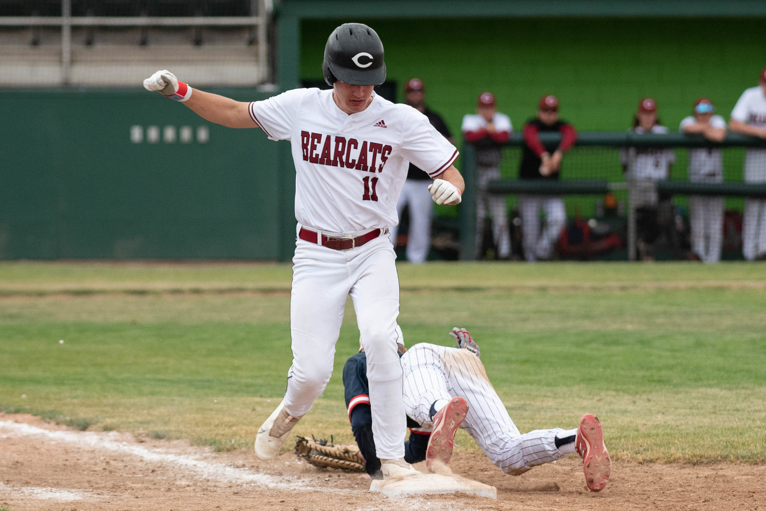 W.F. West's Riggs Westlund is ruled out at first after Ellensburg's first baseman makes keeps his foot on the bag for an out in the 2A State Baseball Third-Place Game at Yakima County Stadium May 28.
