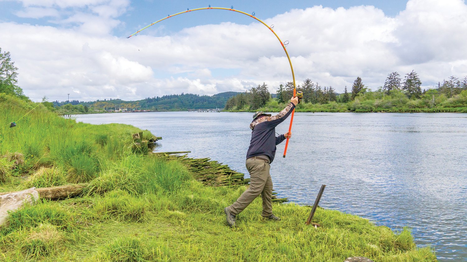 Rich Eaton casts out into the Chehalis River with his new custom Meat Hunter pole equipped with a 16 ounce weight while fishing for white sturgeon in Cosmopolis.