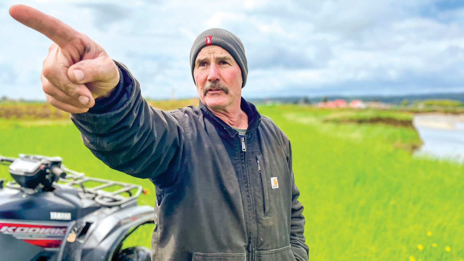 Steve Willis, a farmer who lives near the confluence of Satsop and Chehalis Rivers points and talks about erosion to farm land.