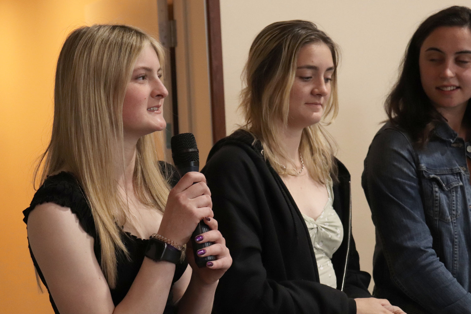 W.F. West senior Lily Bagley speaks during a scholarship luncheon in Chehalis on Monday of her plans to study psychology at Washington State University. She stands next to fellow seniors Kaylynne Dowling and Accadia Hazlett.