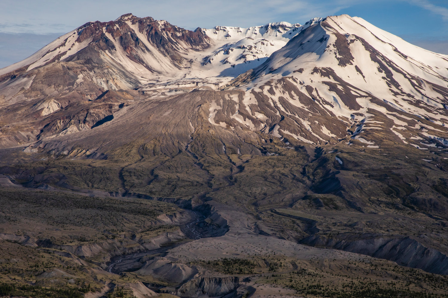 Foothills cast shadows across Mount St. Helens on Wednesday.